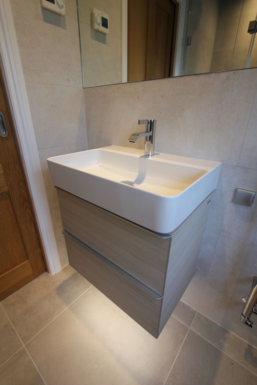 photo of { entry.title }}  bathroom